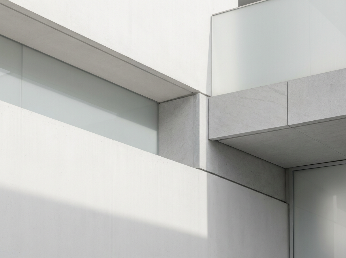 Minimal, abstract architectural background featuring clean geometric lines, soft shadows, and modern building materials. Light grey and white tones, subtle depth, no identifiable location, no people. Emphasis on structure, precision, and engineered surfaces. High‑end corporate aesthetic, suitable for a facilities and engineering brochure. Ultra‑clean, minimal, with gentle contrast and plenty of negative space for text overlay.